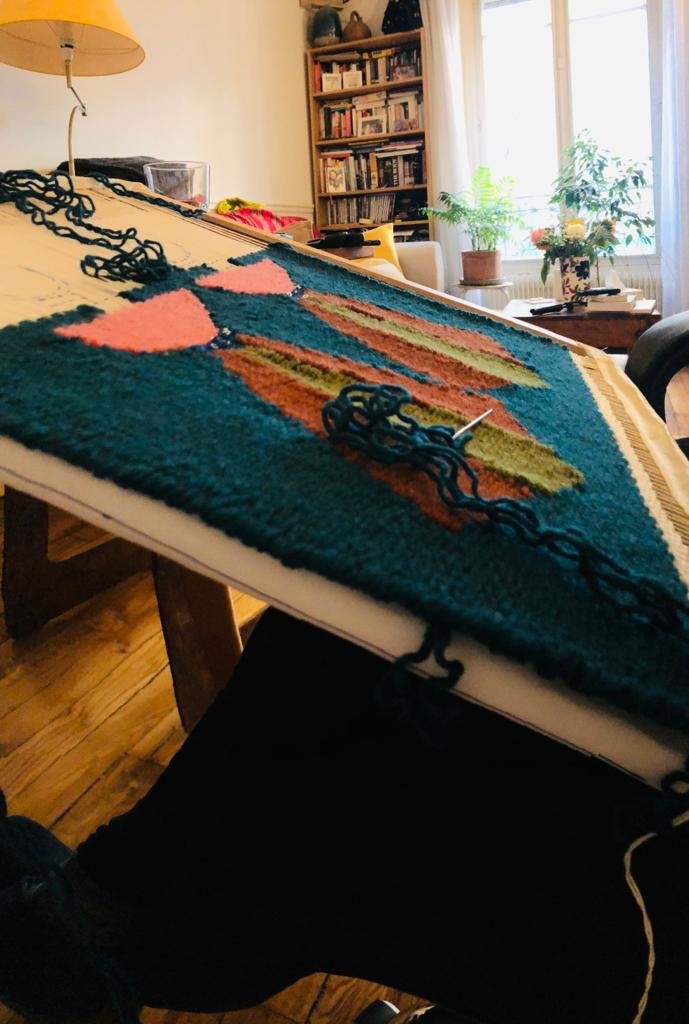 Floor loom with active weaving tapestry in progress